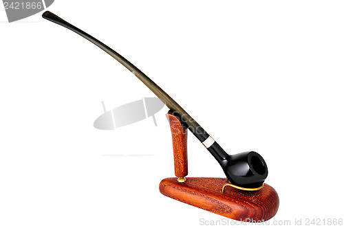 Image of Smoking pipe on stand, isolated