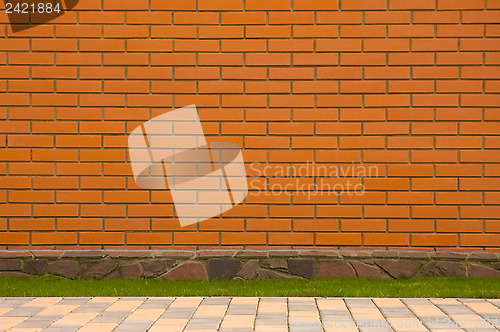 Image of Brick wall with a stone border