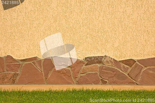 Image of A wall with a stone border 