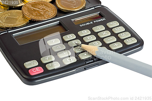 Image of Calculator, coins and pencil