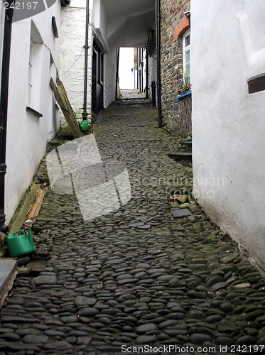 Image of old cottages with cobble path