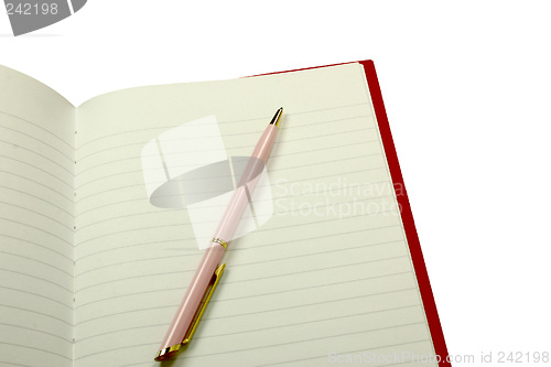 Image of pen on a notebook