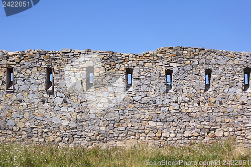 Image of Ancient broken wall with little windows