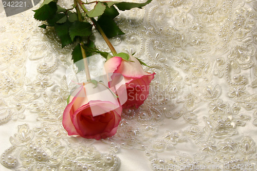 Image of beaded satin and a roses