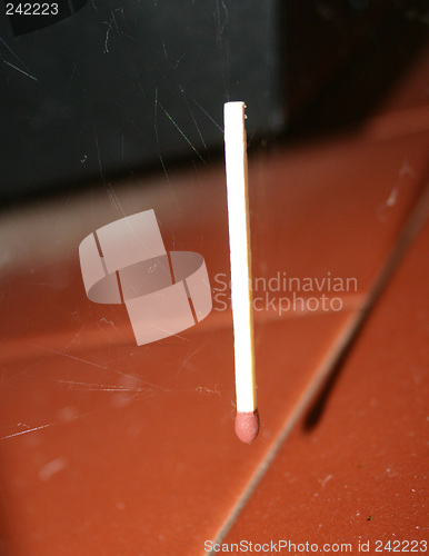 Image of suspended match