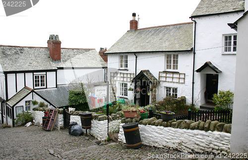 Image of old white washed cottage