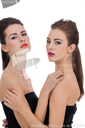 Image of two beautiful girls with colorfull makeup isolated