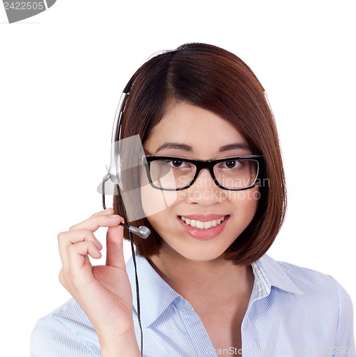 Image of young smiling asian businesswoman call center agent isolated
