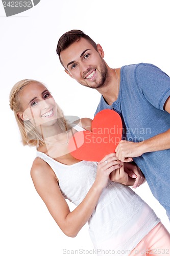 Image of happy young couple in love with red heart valentines day 
