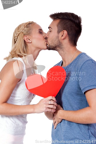 Image of happy young couple in love with red heart valentines day 