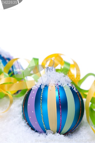 Image of christmas decoration baubles in blue and turquoise isolated