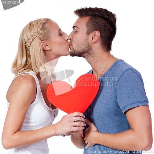 Image of happy young couple in love with red heart valentines day 