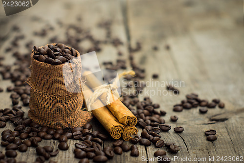 Image of Coffee beans and cinnamon stick