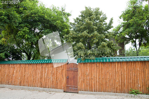 Image of wooden fence with gate