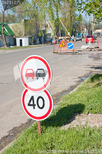 Image of sign on road. focus on sign