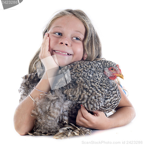 Image of child and chicken