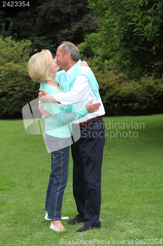 Image of Romantic senior couple kissing