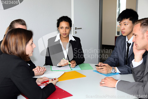 Image of Group of business people in a meeting