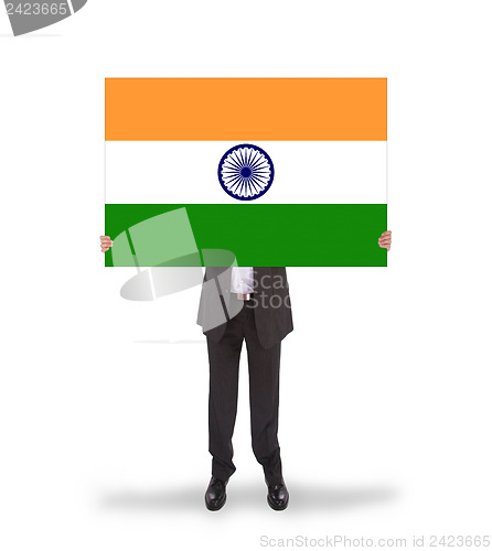 Image of Businessman holding a big card, flag of India