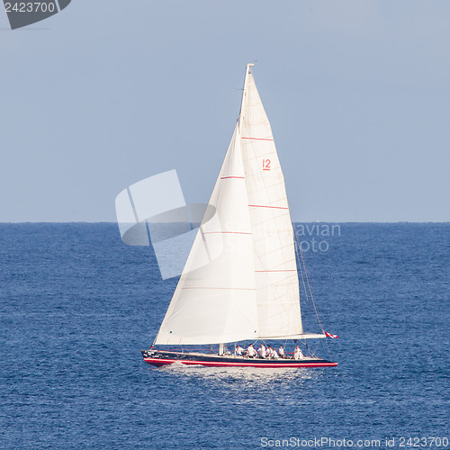 Image of Small sailboat sailing on sea