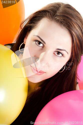 Image of Beautiful woman with multicolored air balloons