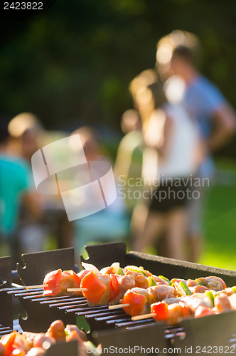 Image of Skewers Grilling On Barbecue