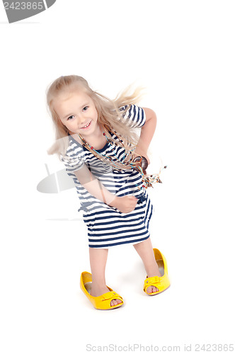 Image of Little cute girl in studio
