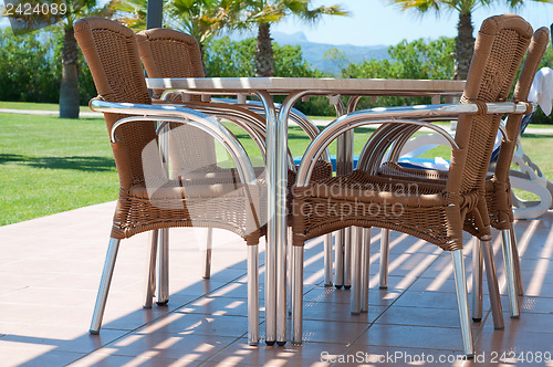 Image of Chairs and table near apartments