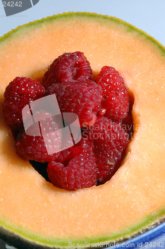 Image of cantaloupe with raspberries