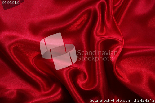 Image of Smooth elegant red silk as background