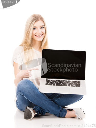 Image of Woman working on a laptop