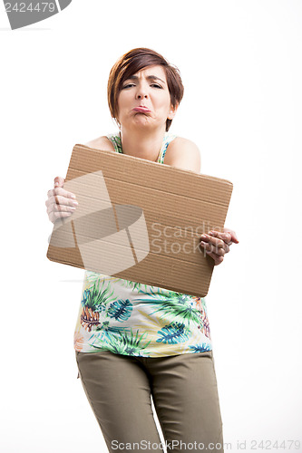 Image of Woman with sad news on a card