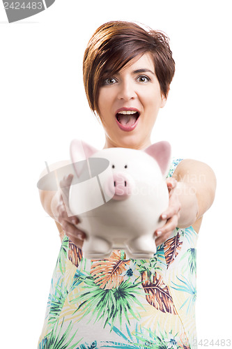 Image of Beautiful woman showing a piggybank