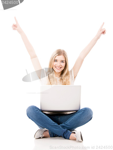 Image of Woman working on a laptop