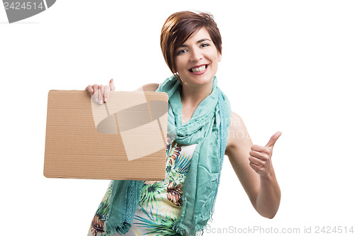 Image of Beautiful woman with a cardboard