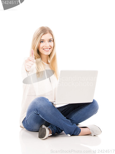 Image of Woman working on a laptop