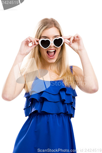 Image of Woman in blue with sunglasses