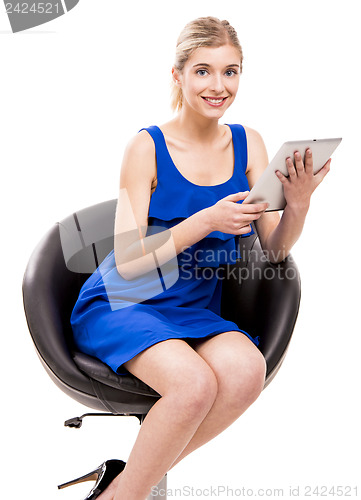 Image of Woman working with a tablet