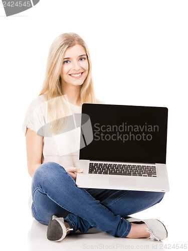 Image of Woman working on a laptop