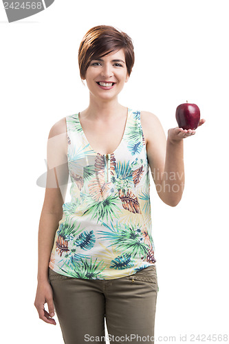 Image of Beautiful woman holding a apple