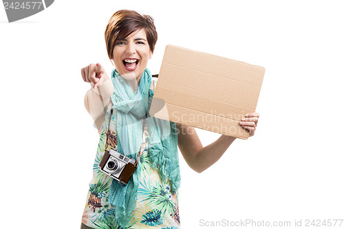 Image of Woman with a vintage camera and a cardboard