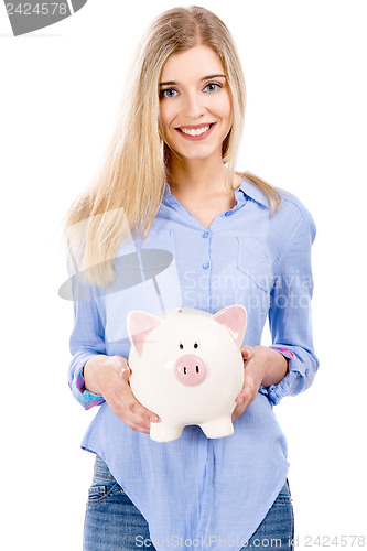 Image of Beautiful woman holding  a piggy bank