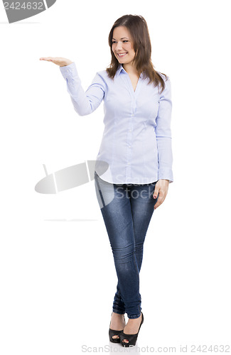 Image of Woman showing something on the hand