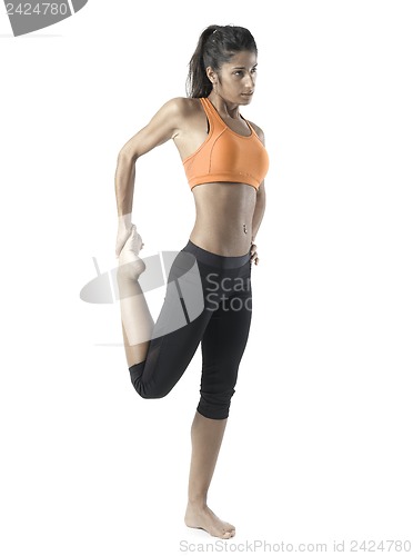 Image of fit woman stretching on white