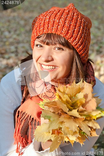 Image of beautiful woman with autumn