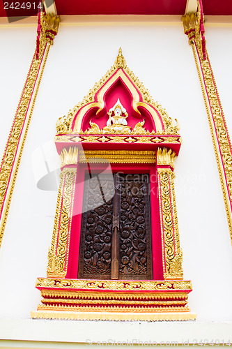 Image of Thai Wood Carving on window temple