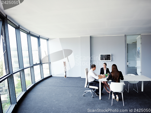 Image of business people in a meeting at office