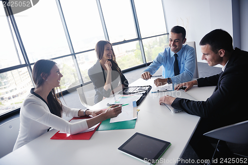 Image of business people in a meeting at office