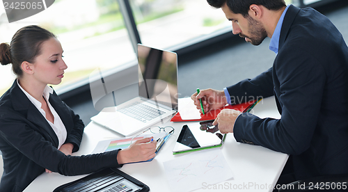 Image of business people in a meeting at office