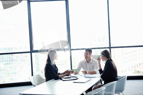 Image of business people in a meeting at office